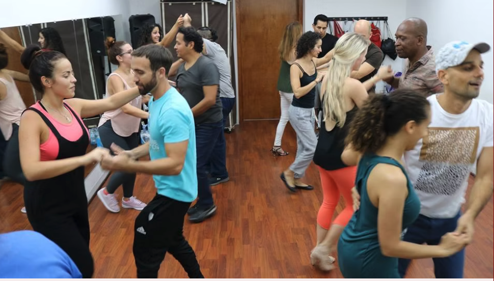 People dancing at a social dance event